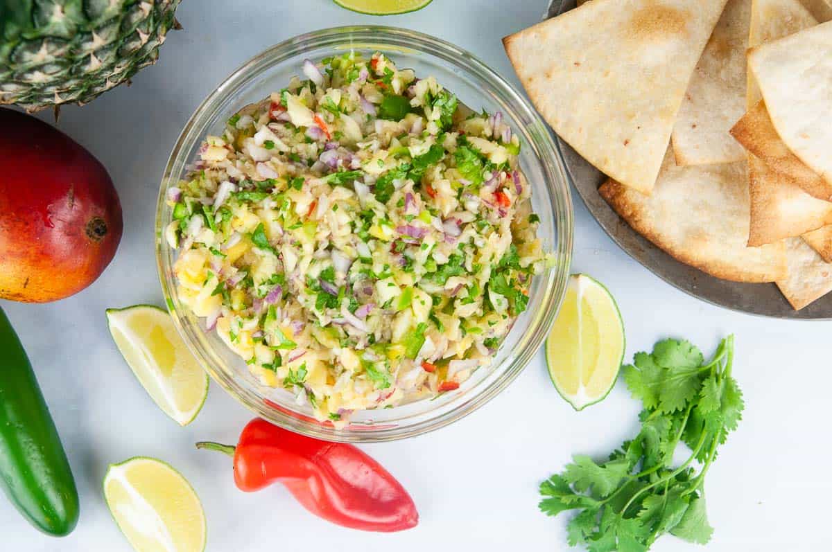 Pineapple mango salsa makes a yummy dip for chips or topping for tacos, grilled chicken, and fish.