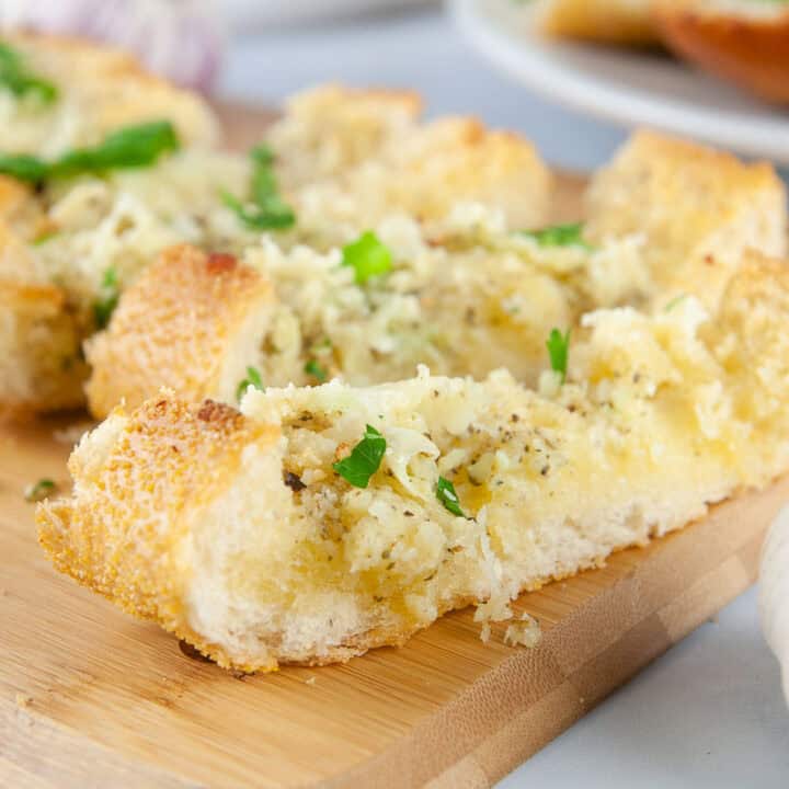 Easy cheesy garlic bread makes a perfect side dish for any pasta, soup, or salad.