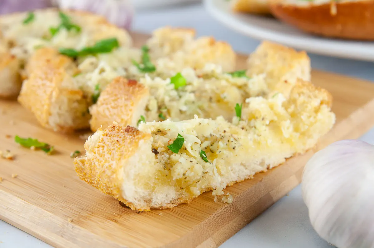 Easy cheesy garlic bread makes a perfect side dish for any pasta, soup, or salad.