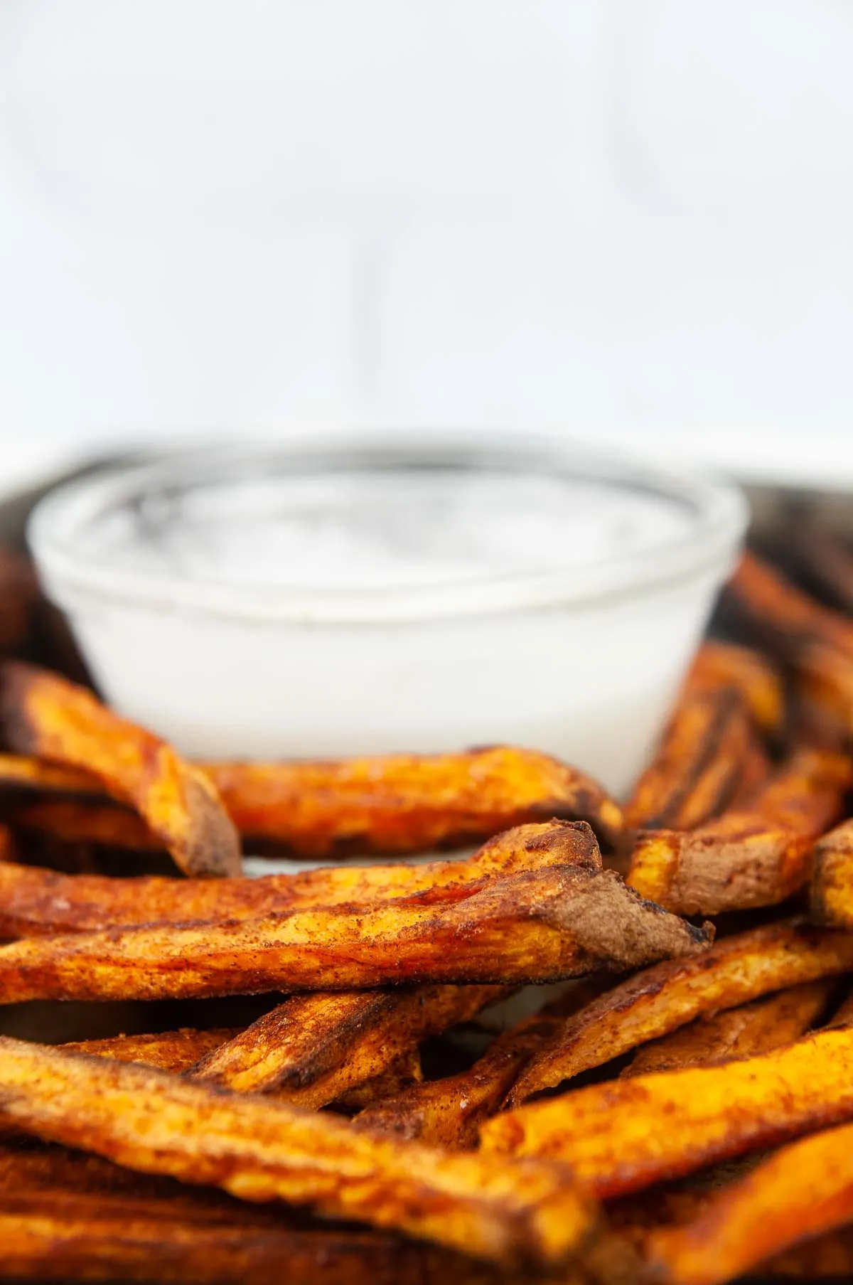 Baked Cinnamon Sugar sweet potato fries with a powder sugar glaze dip