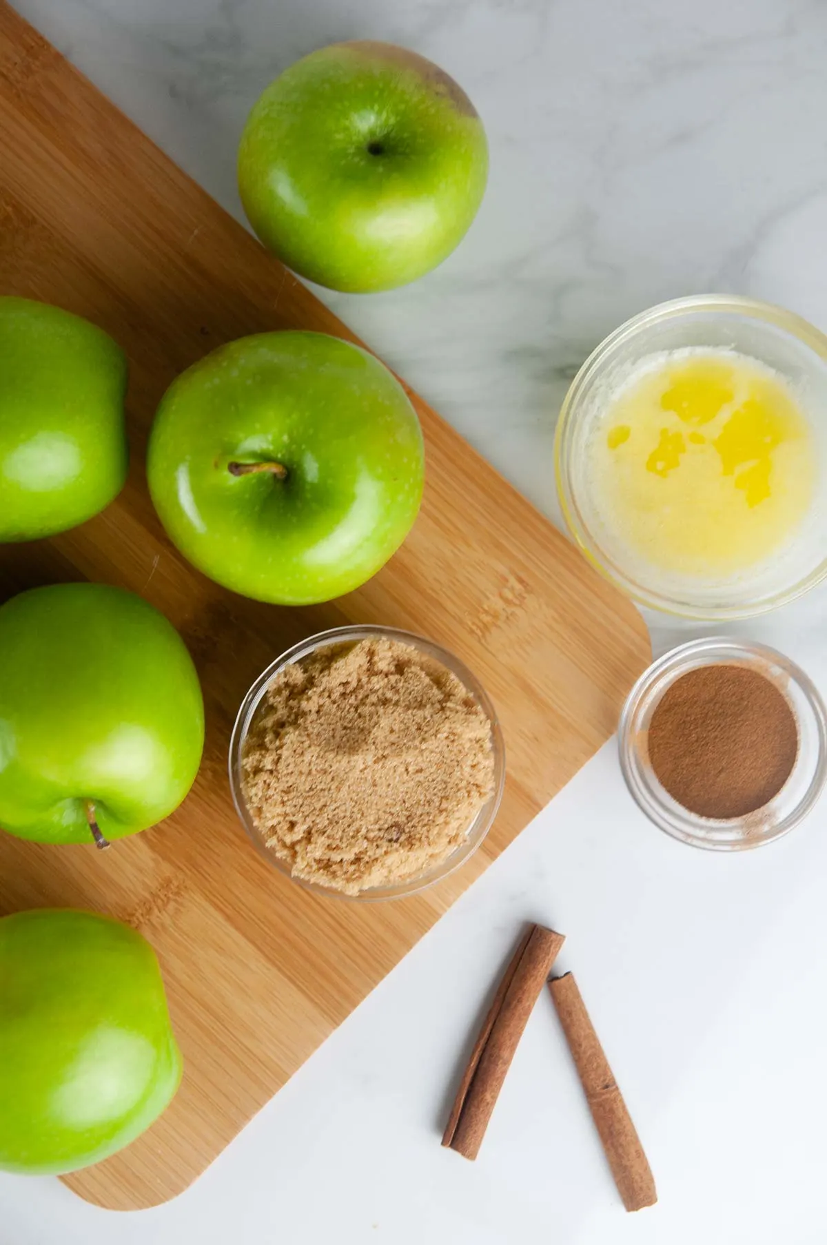 Ingredients for Air Fryer Apples: Apples, Butter, Sugar, and Cinnamon