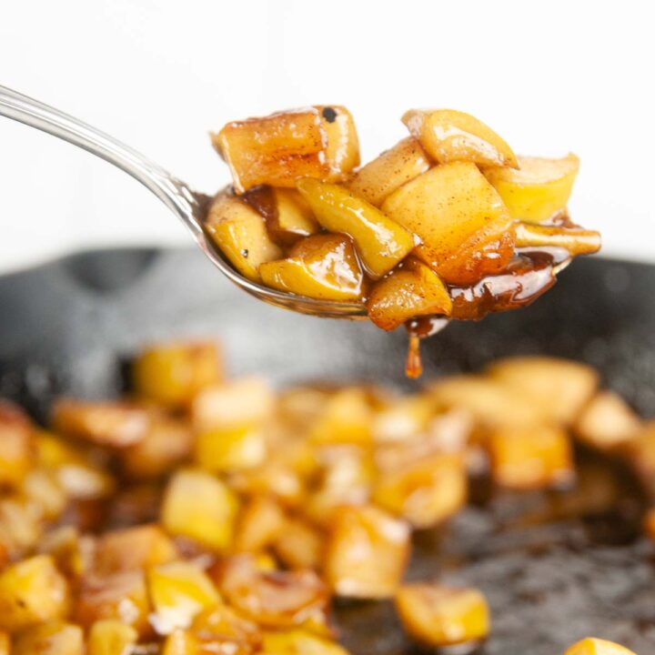 A spoonful of easy fried apples- a yummy fall or holiday side dish or a perfect pancake or icing topping