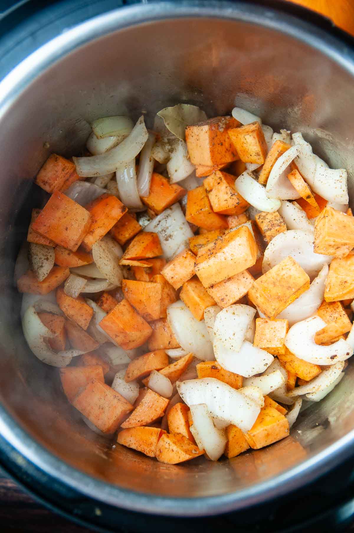 Saute the onions and sweet potato in the olive oil with spices