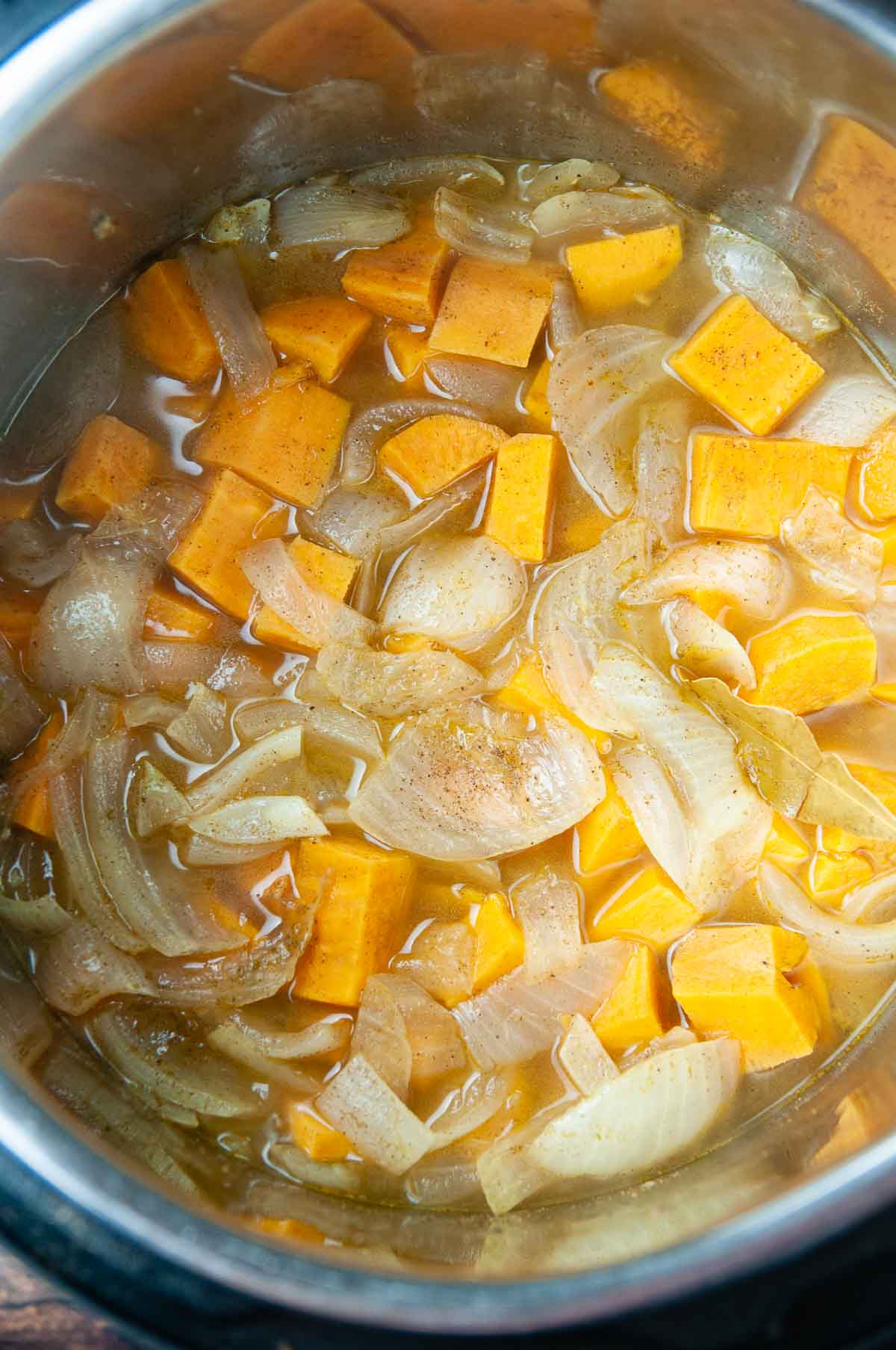 After pressure cooking the onions and sweet potatoes in spices and broth they should be soft.