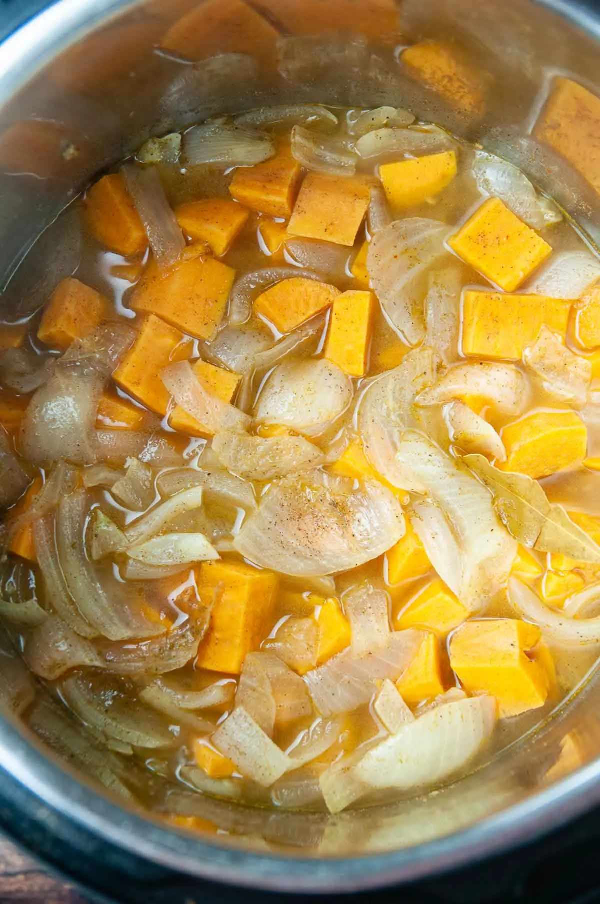 After pressure cooking the onions and sweet potatoes in spices and broth they should be soft.