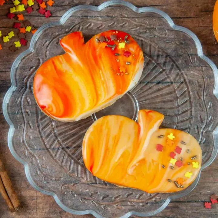 Marbled Cut Out Pumpkin Spice Cookies are a delicious fun fall treat. A great kid friendly alternative to pie for Thanksgiving or fun dessert for Halloween.