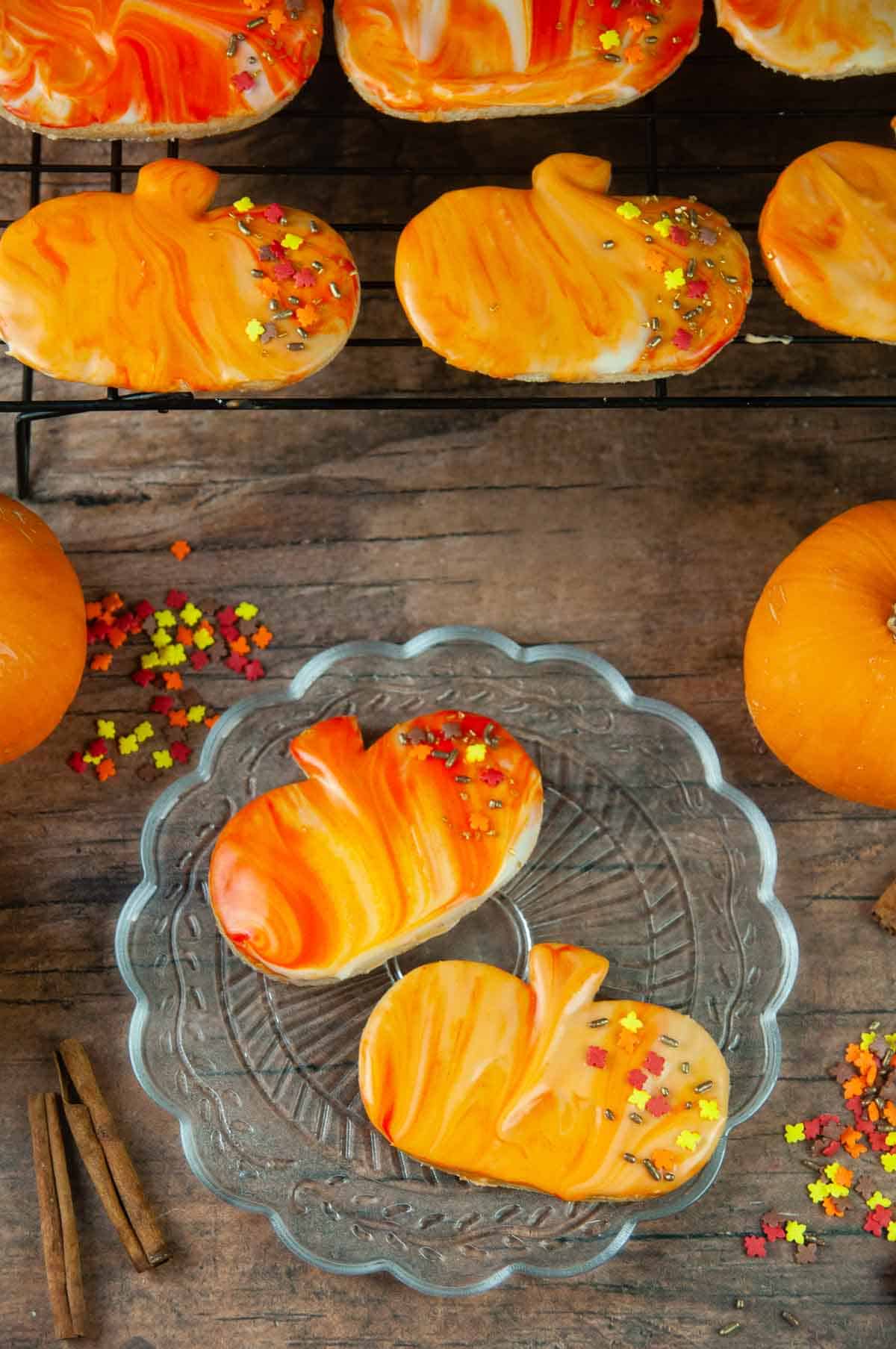 Marbled Cut Out Pumpkin Spice Cookies are a delicious fun fall treat. A great kid friendly alternative to pie for Thanksgiving or fun dessert for Halloween.