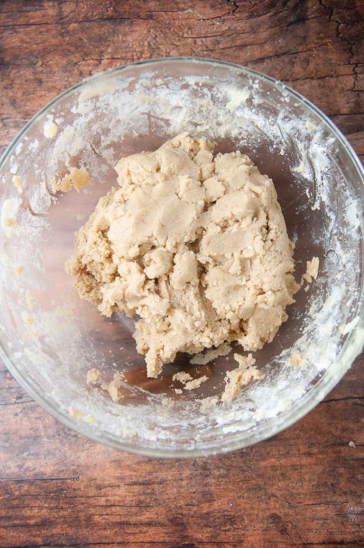 Mix the dry ingredients into the wet ingredients until it forms cookie dough.
