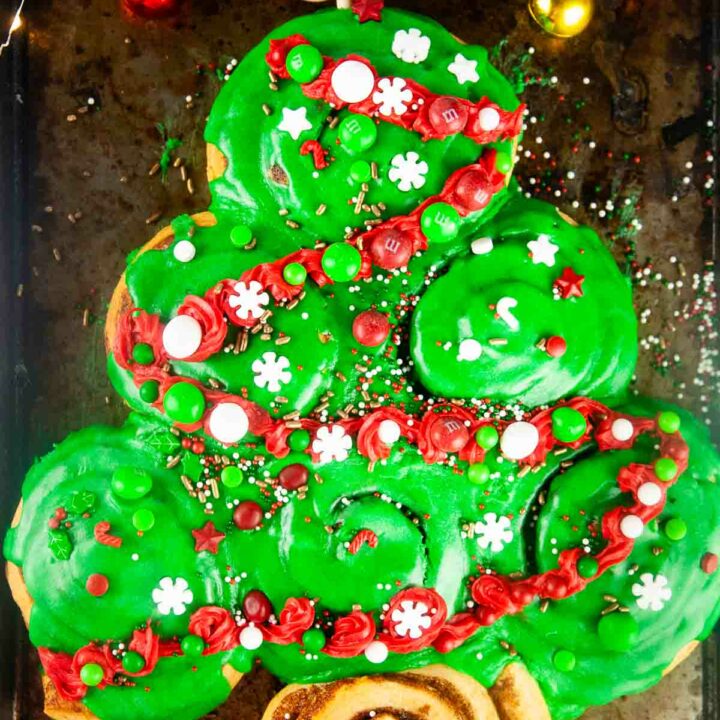Easy Cinnamon Roll Christmas Tree for Christmas Morning are a fun breakfast for the holidays that you can make with the kids.