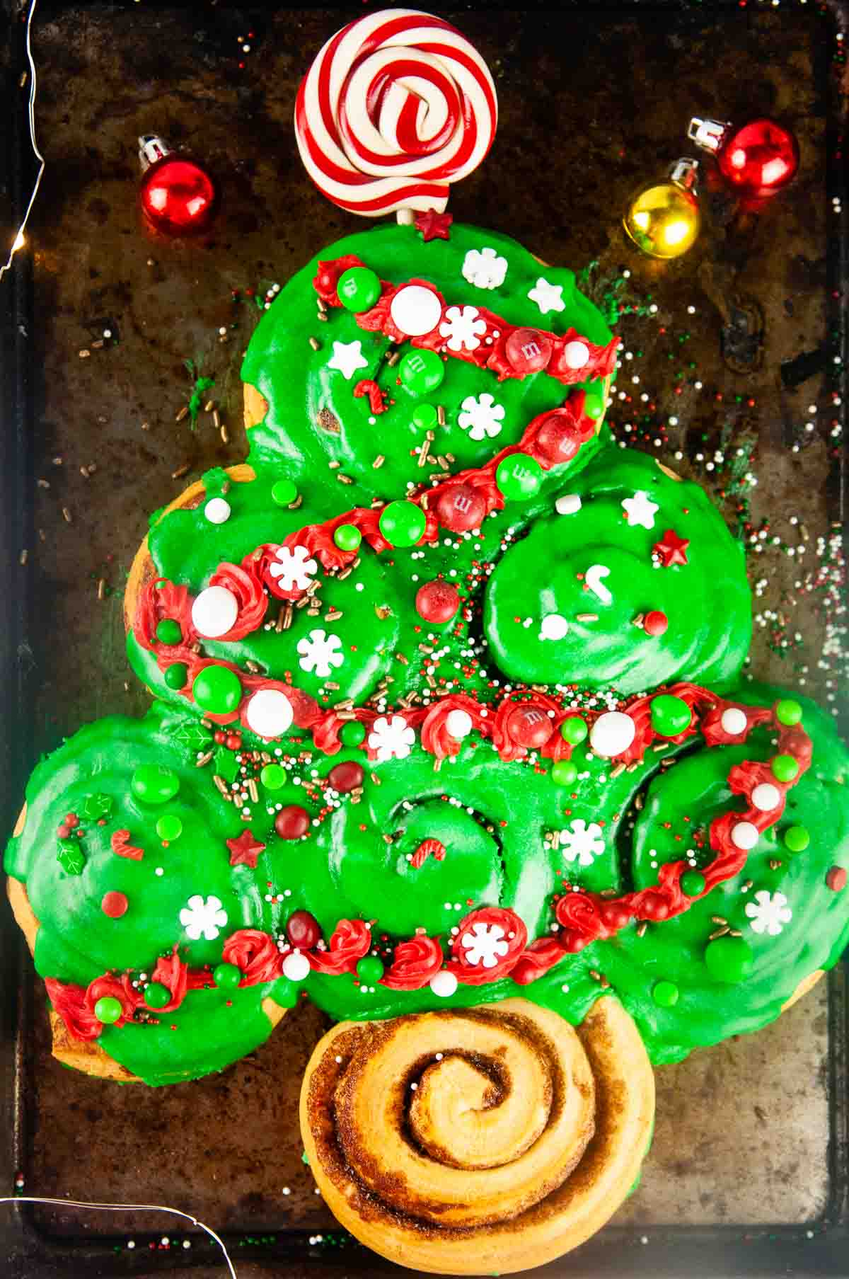 Easy Cinnamon Roll Christmas Tree for Christmas Morning are a fun breakfast for the holidays that you can make with the kids.