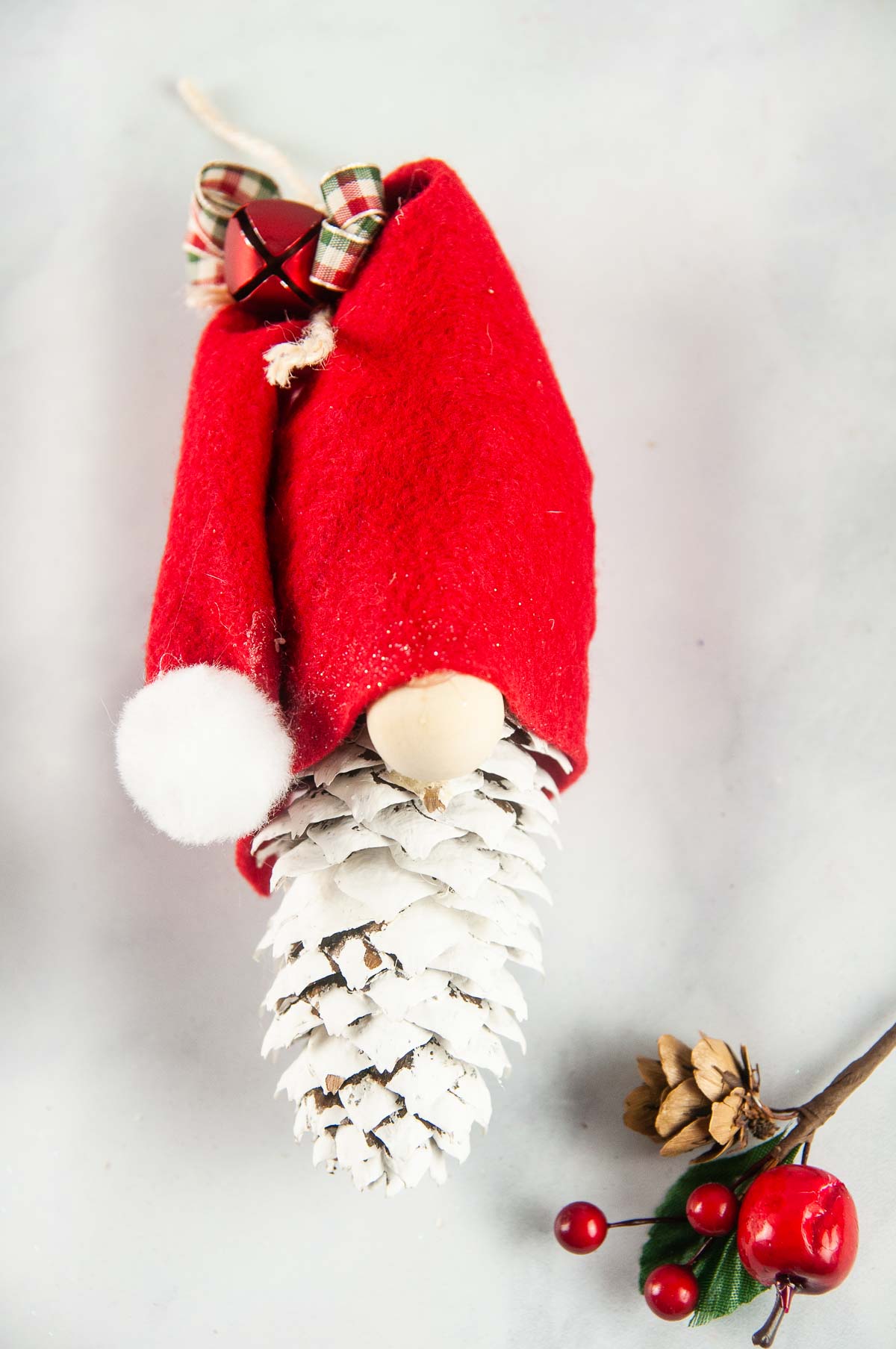 Embelish the gnome hat with a bow or jingle bells.
