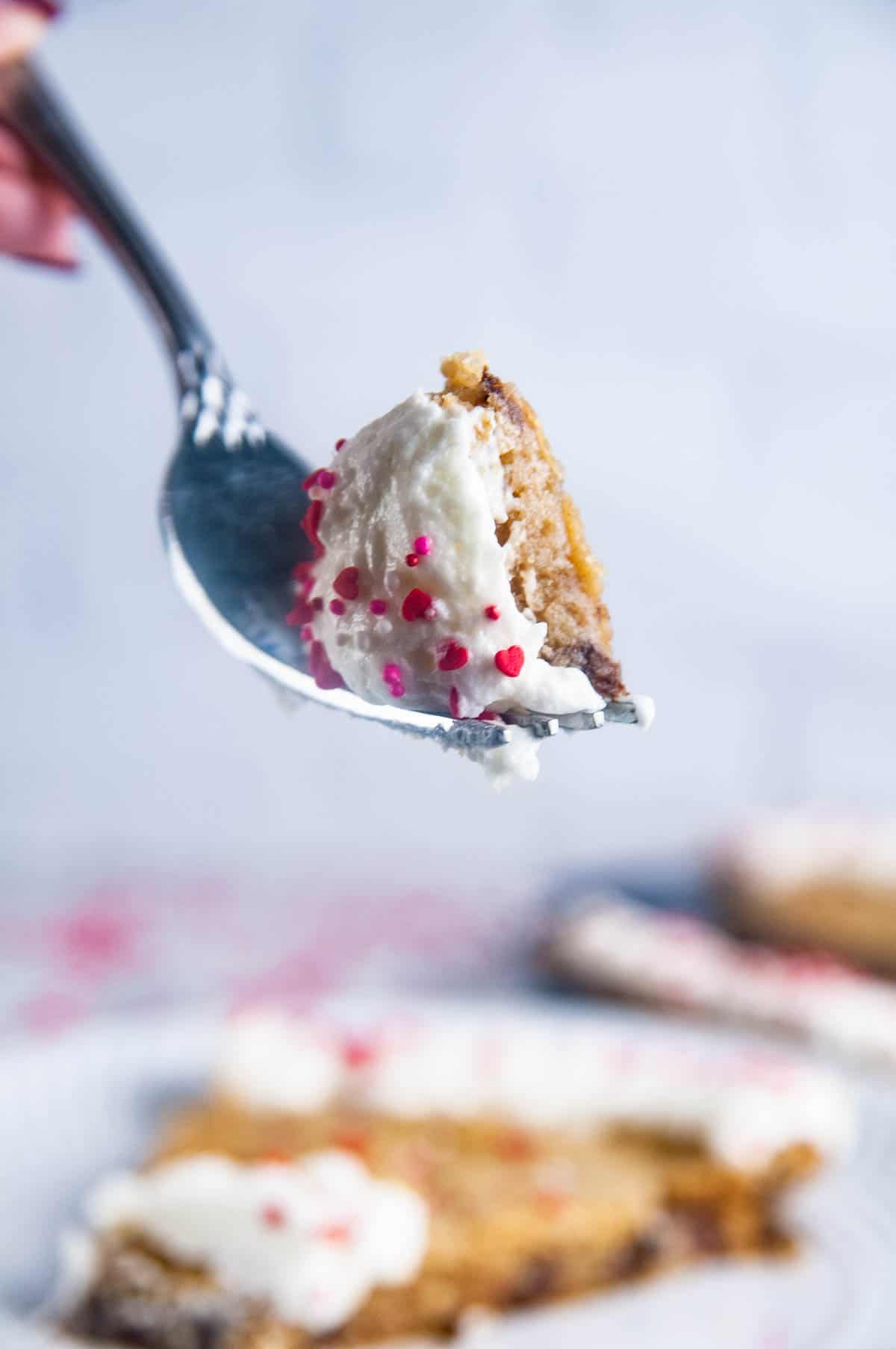 A piece of Valentine's Day heart shaped cookie cake