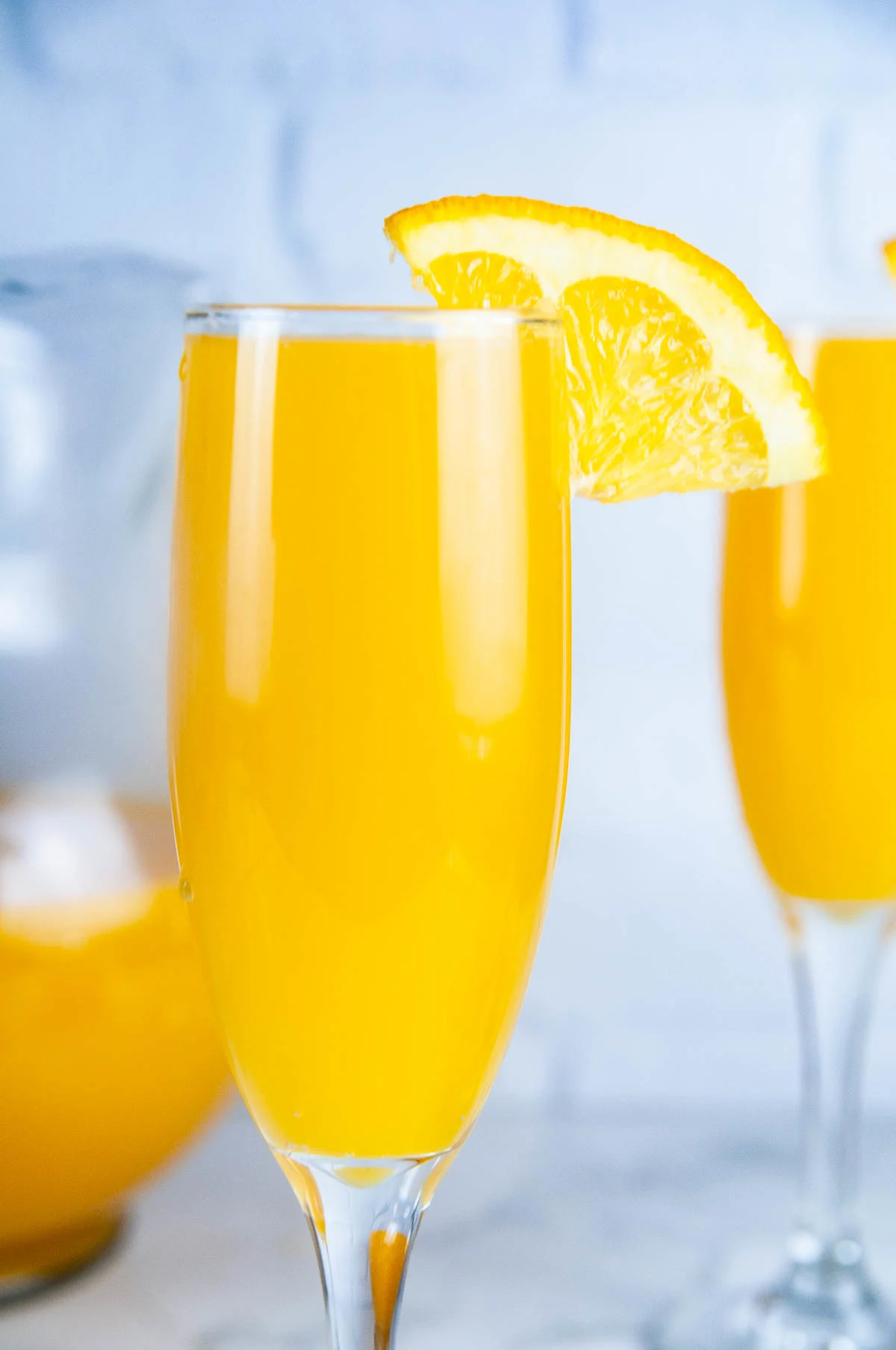 Sweet peach mimosas are a delicious update to the classic brunch drink.