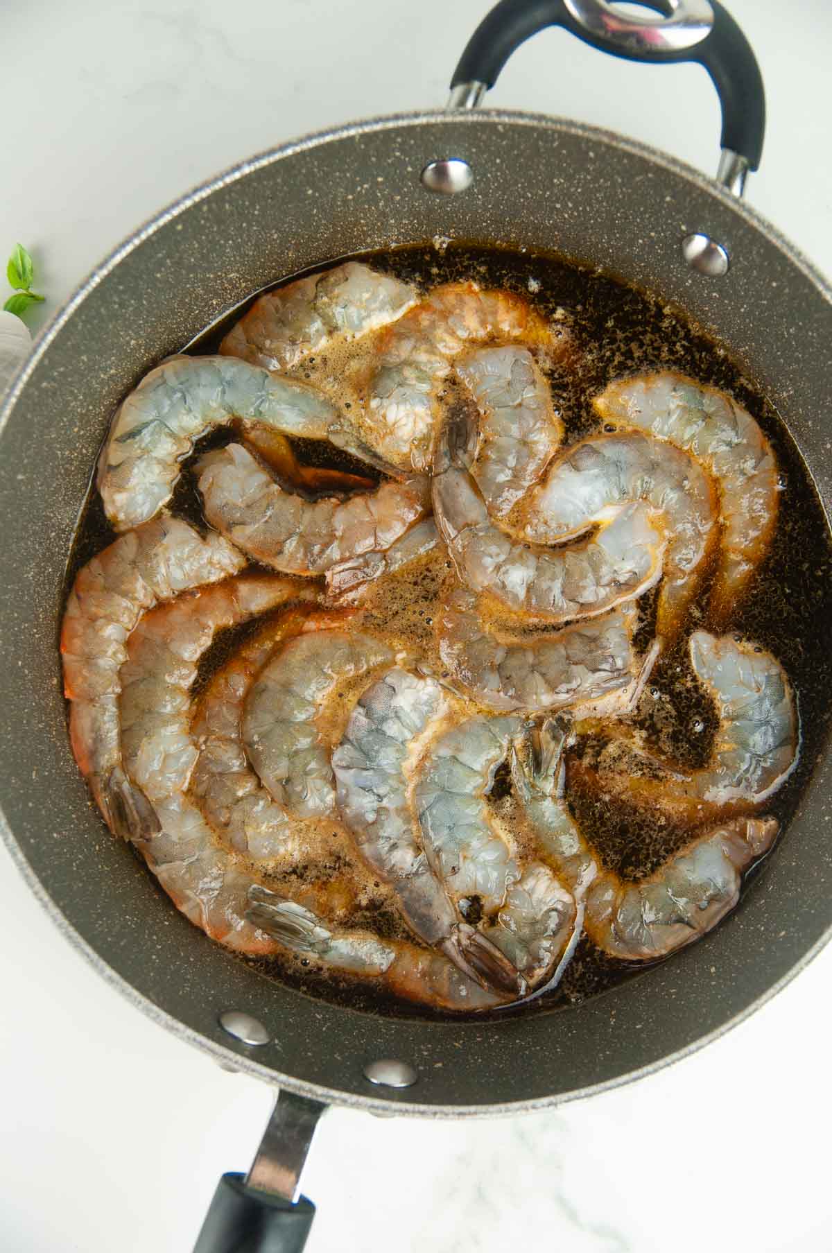 Cook the shrimp for shrimp caprese pasta