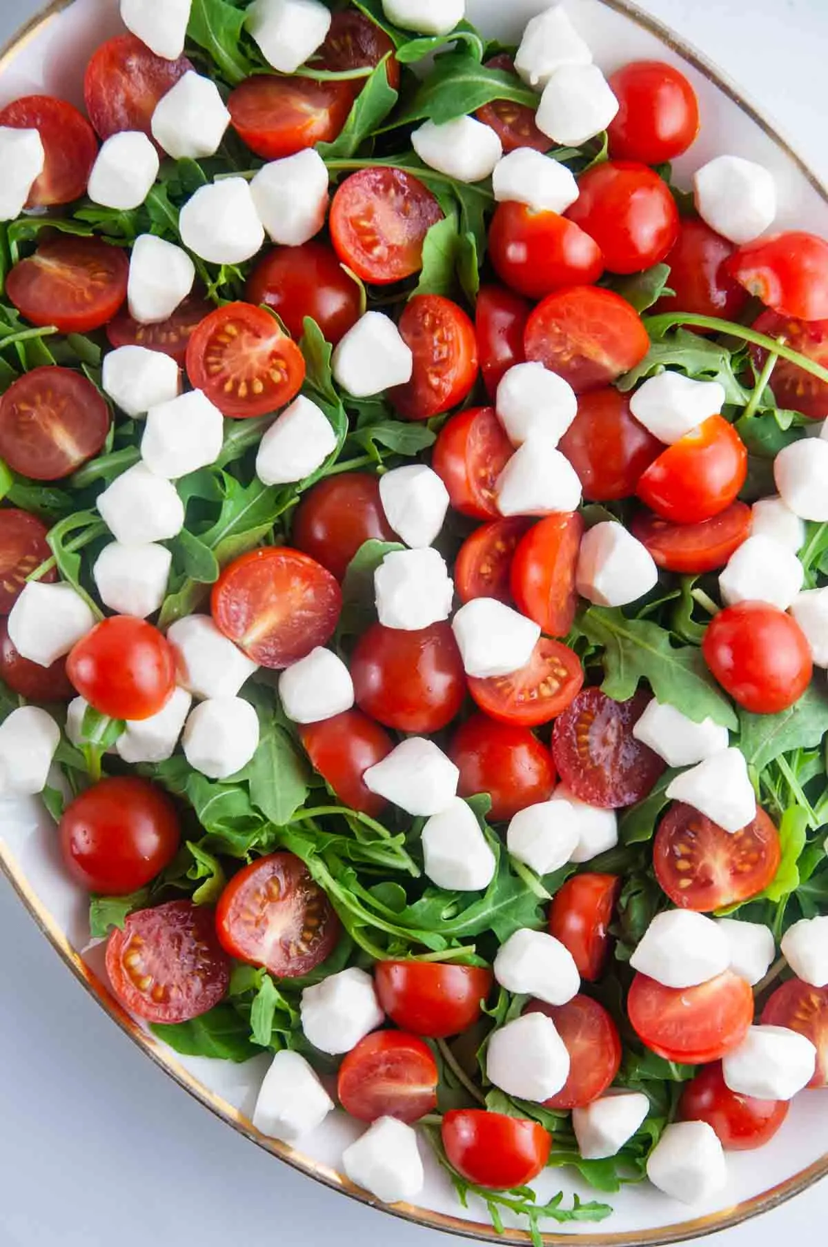 Assemble the Caprese Salad.