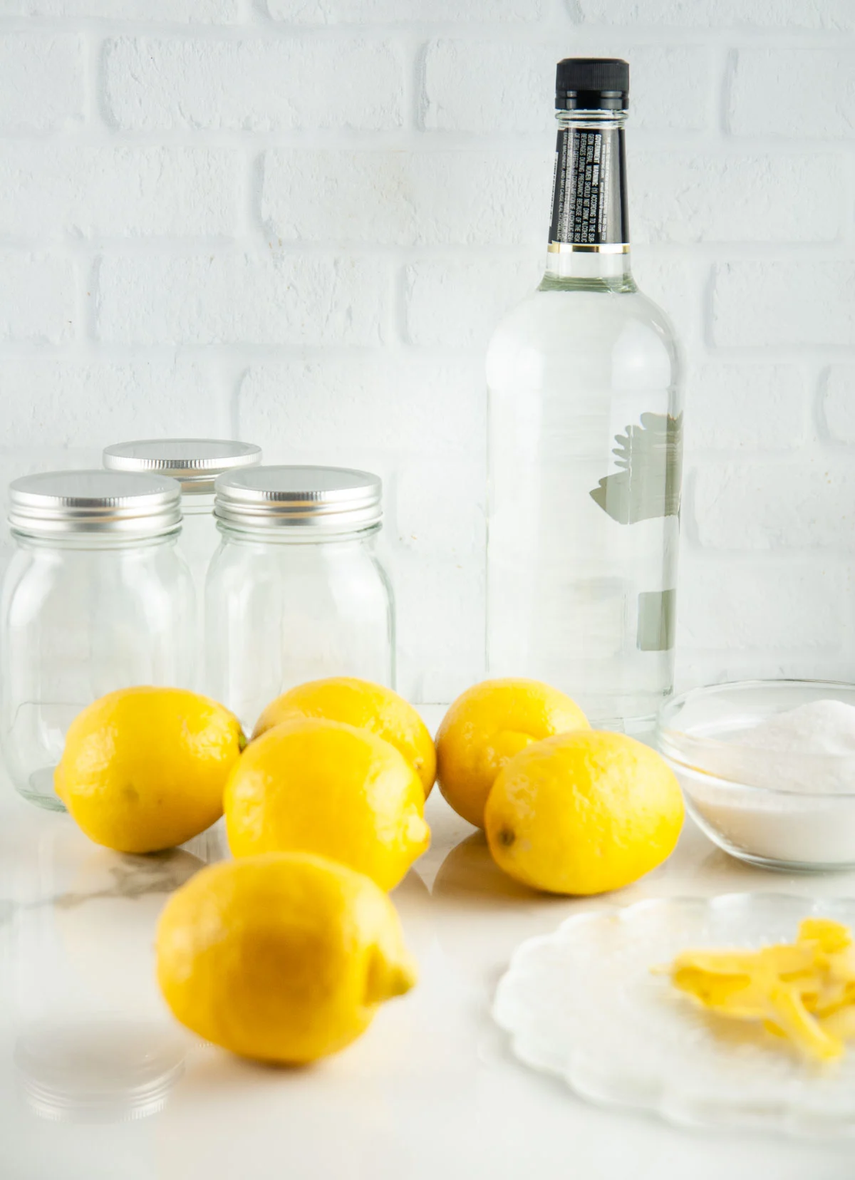 Ingredients for Homemade Limoncello Recipe: Vodka, Lemons, Sugar, Water