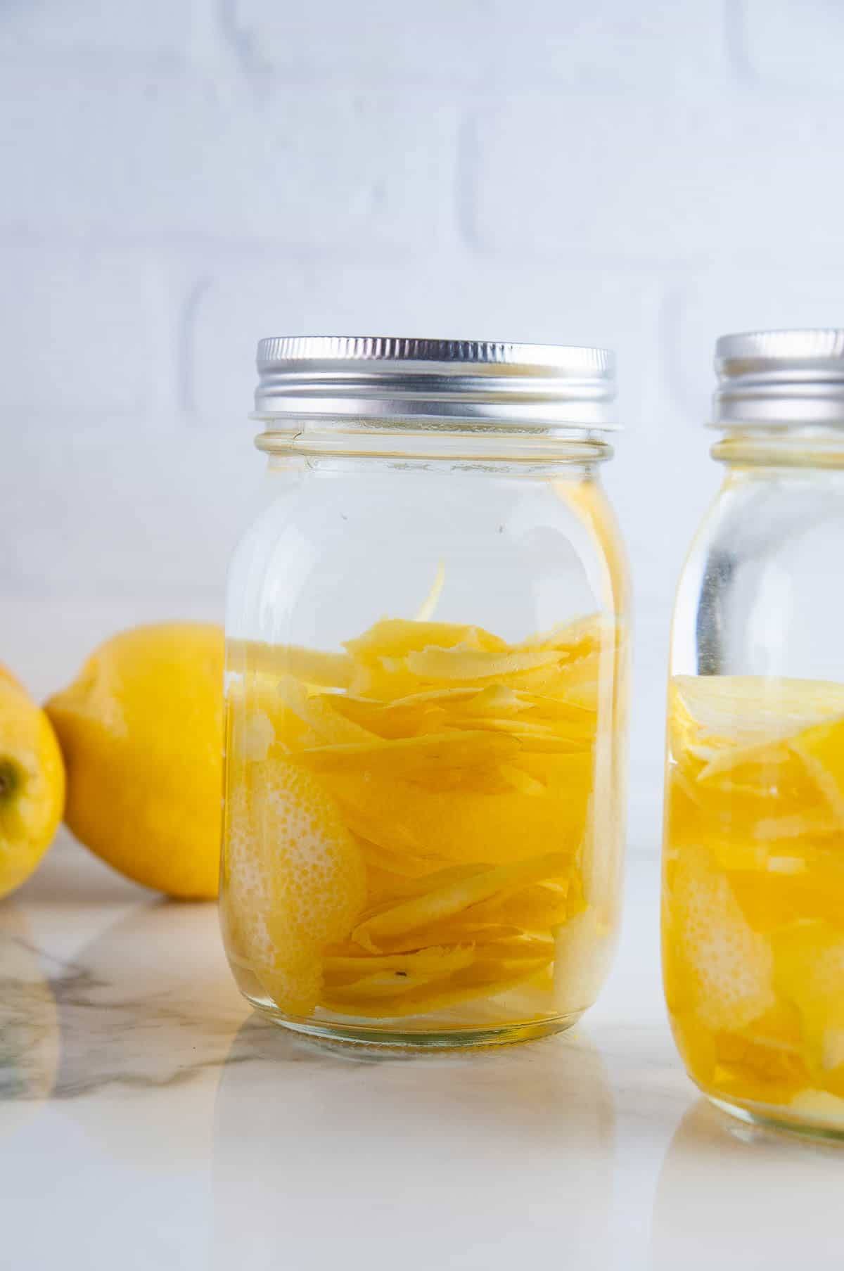 Let the lemon peels sit in the vodka.