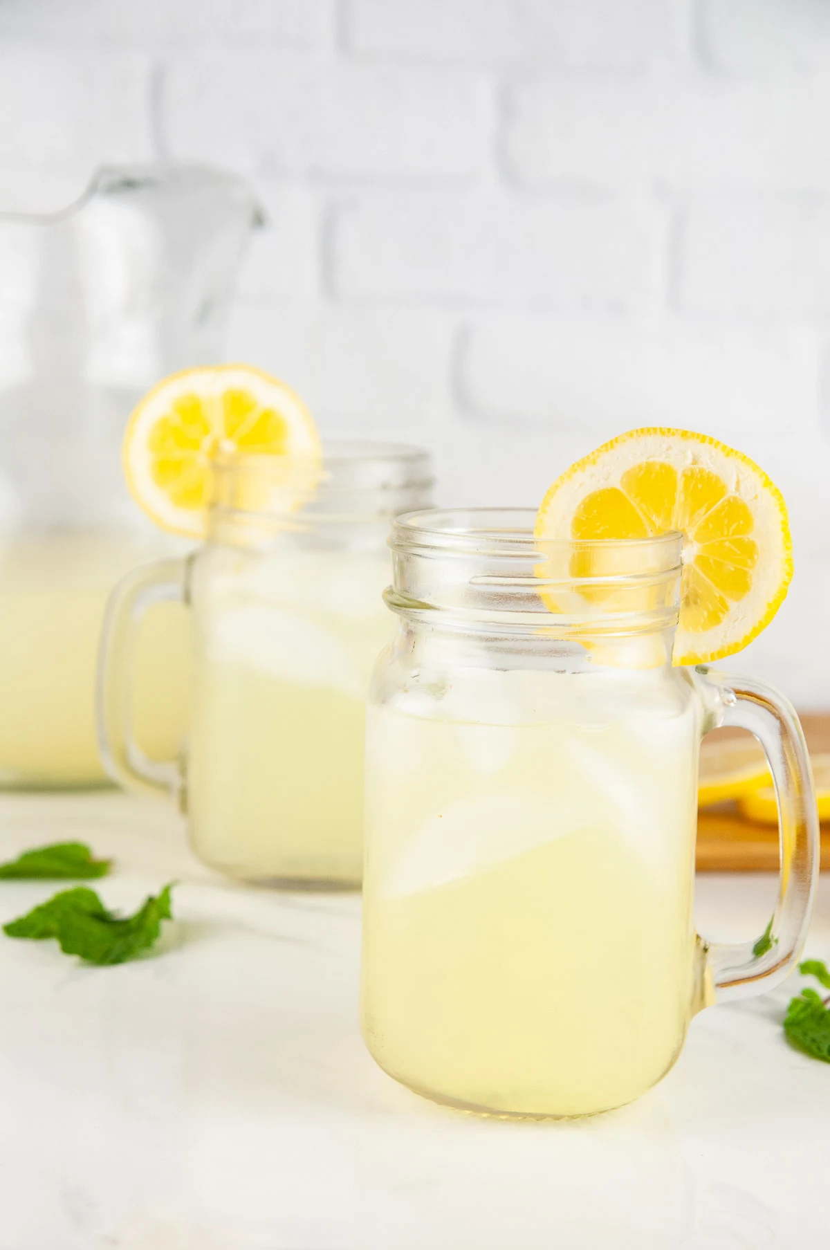 This easy alcoholic lemonade cocktail recipe uses the classic summer drink to make an adult, boozy beverage. You'll be sipping this spiked lemonade all summer long!
