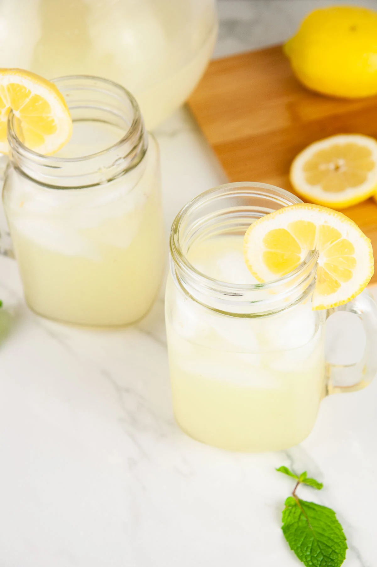 This easy alcoholic lemonade cocktail recipe uses the classic summer drink to make an adult, boozy beverage. You'll be sipping this spiked lemonade all summer long!