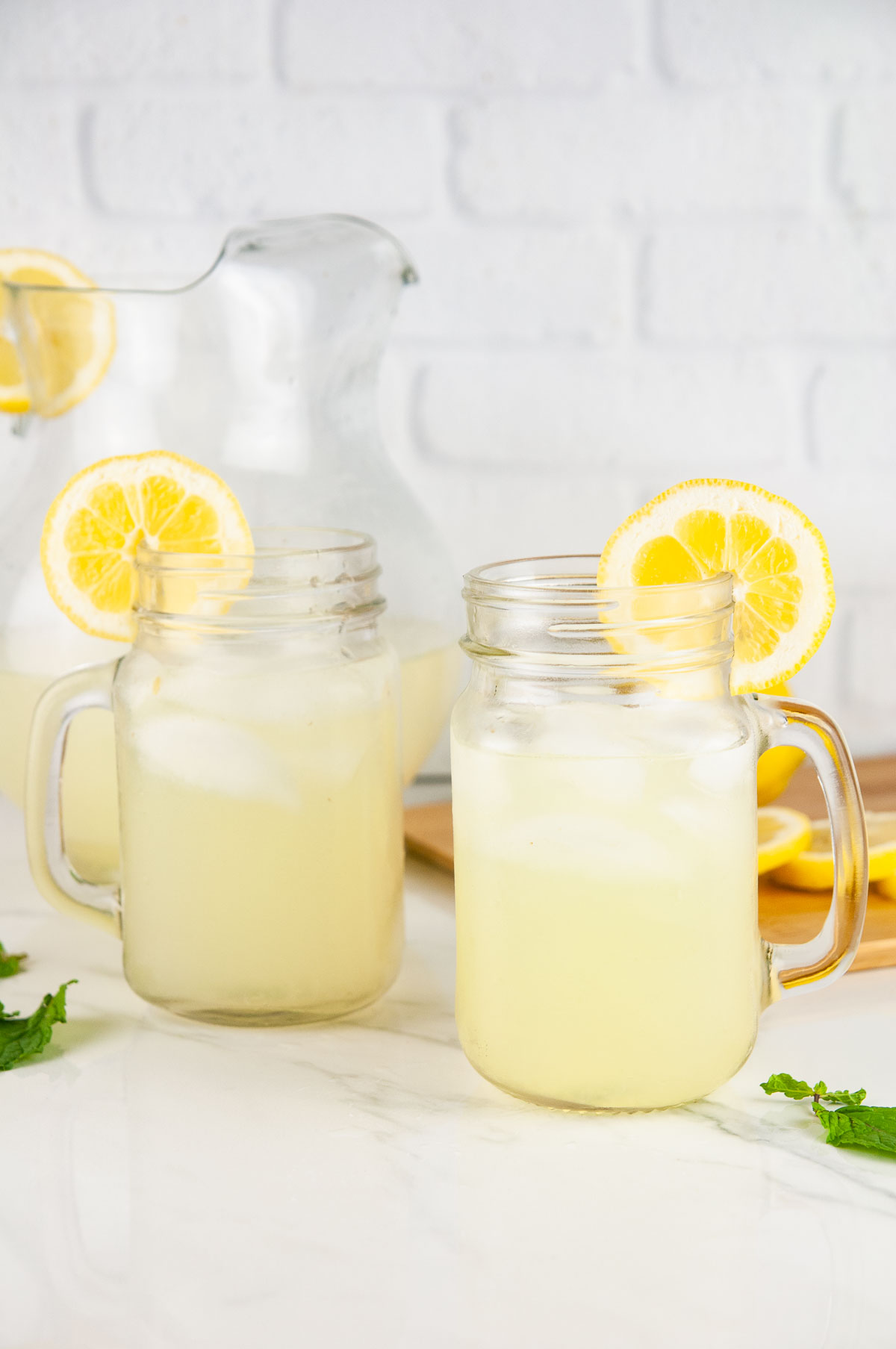 This easy alcoholic lemonade cocktail recipe uses the classic summer drink to make an adult, boozy beverage. You'll be sipping this spiked lemonade all summer long!