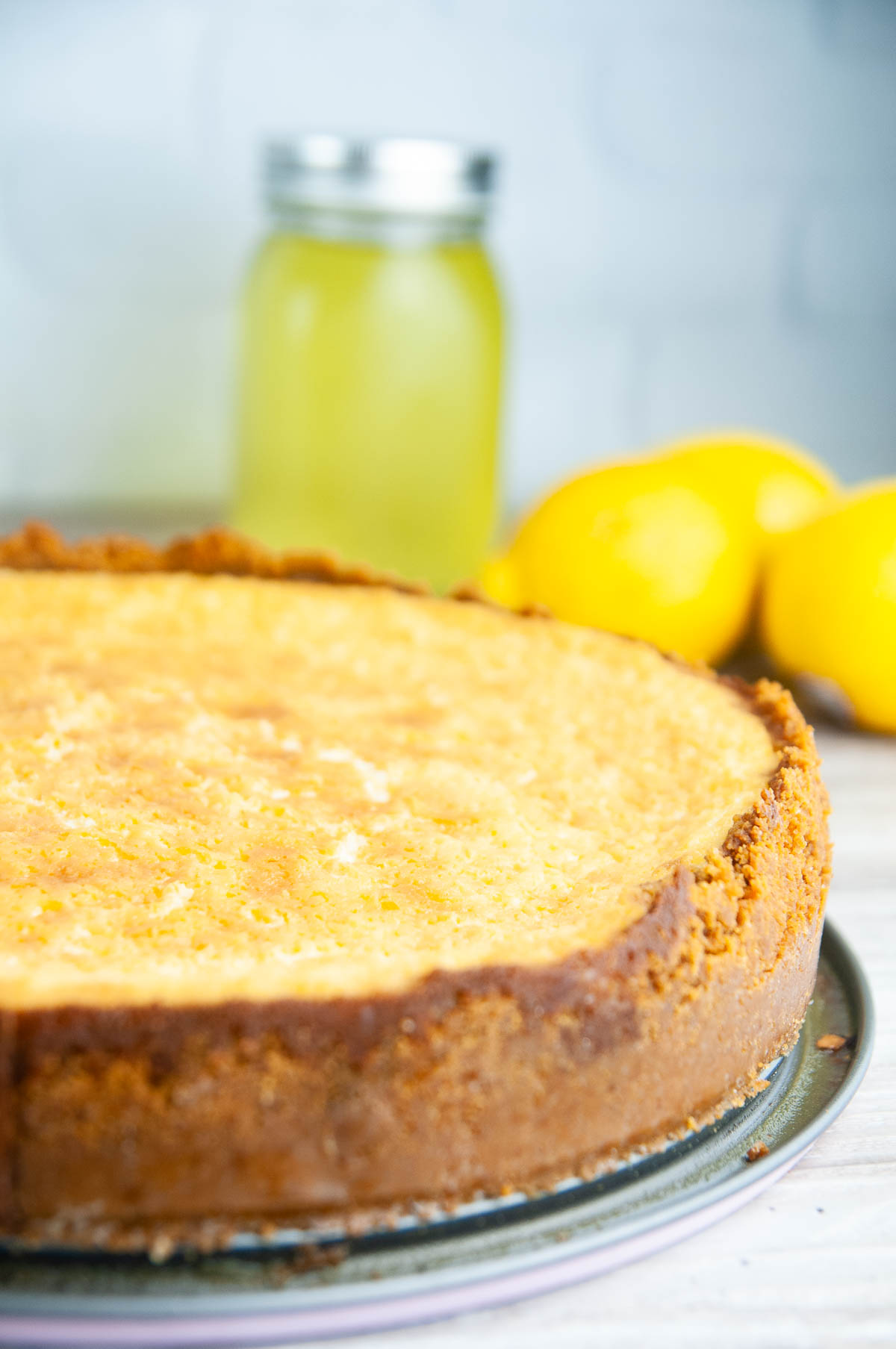 Graham cracker crust on a limoncello cheesecake