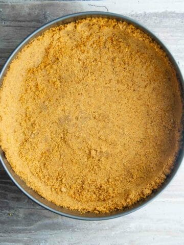 Baked graham cracker crust ready to be fillied