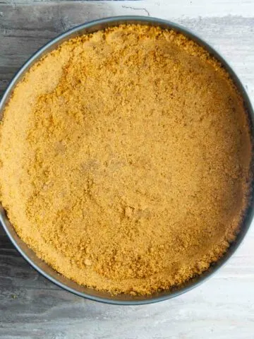 Baked graham cracker crust ready to be fillied