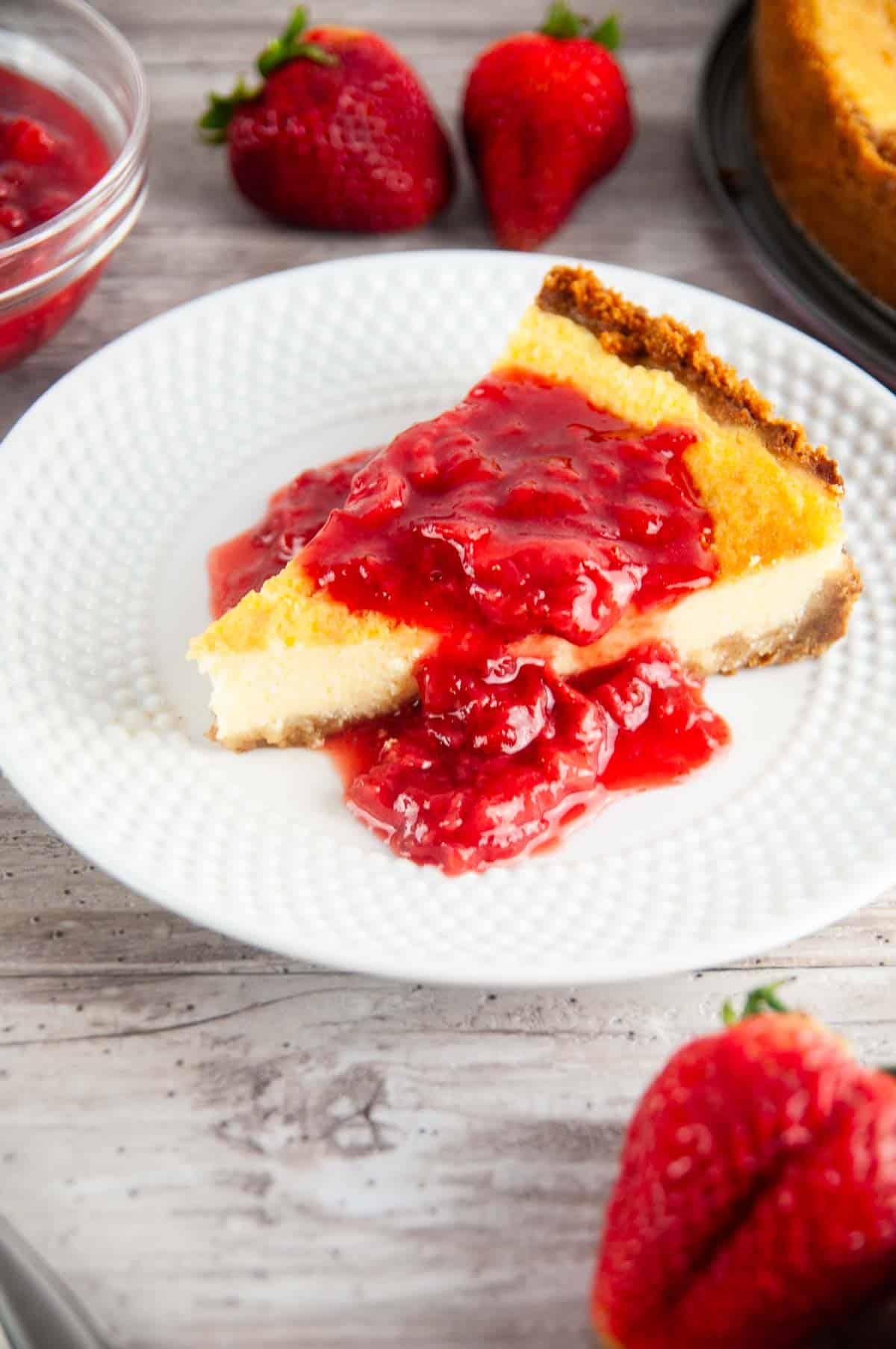 Learn how to make strawberry topping for cheesecake with this easy recipe. With only 3 ingredients, you'll be whipping this up and spooning it onto cheesecakes, other desserts, and even on waffles and pancakes all the time!