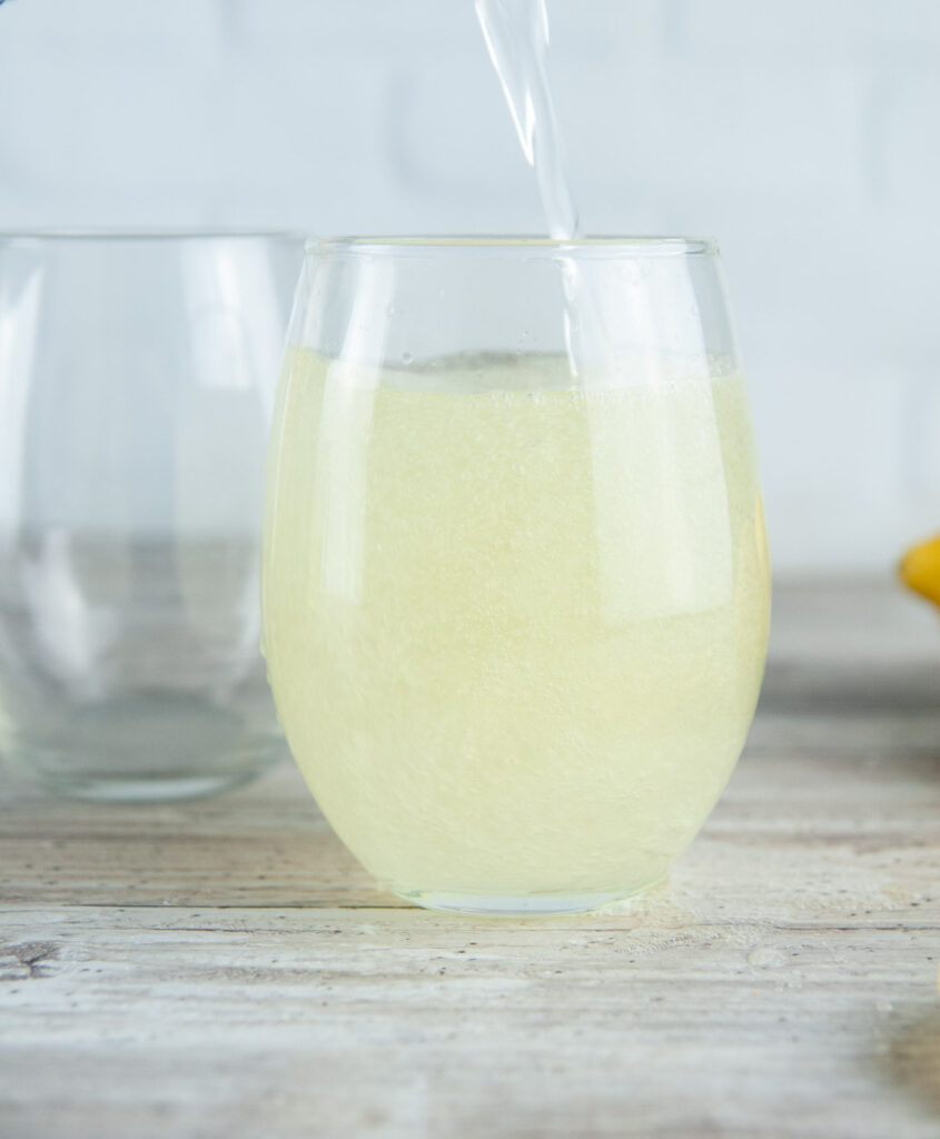 Top the limoncello spritz off with a splash of club soda.