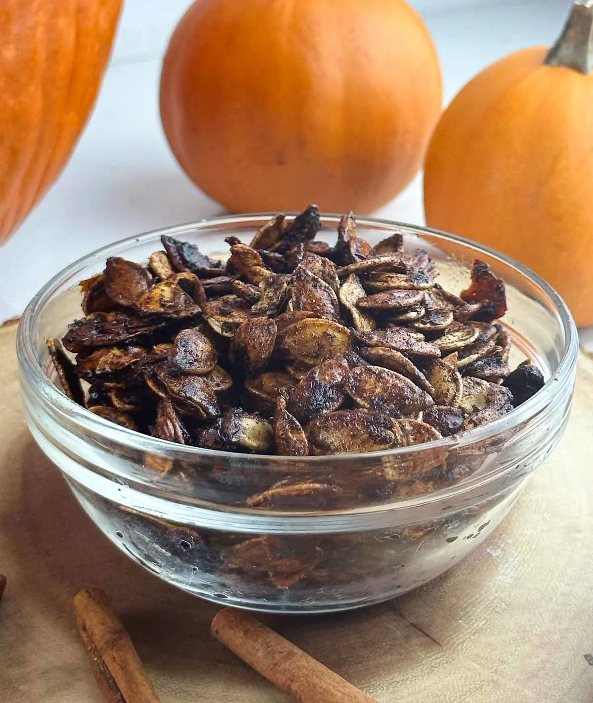 Honey roasted pumpkin seeds are an easy way to make use of the seeds from your Halloween pumpkin. Pumpkin seeds get tossed with olive oil, sweet honey, cinnmon, and sea salt for a yummy snack or topping!