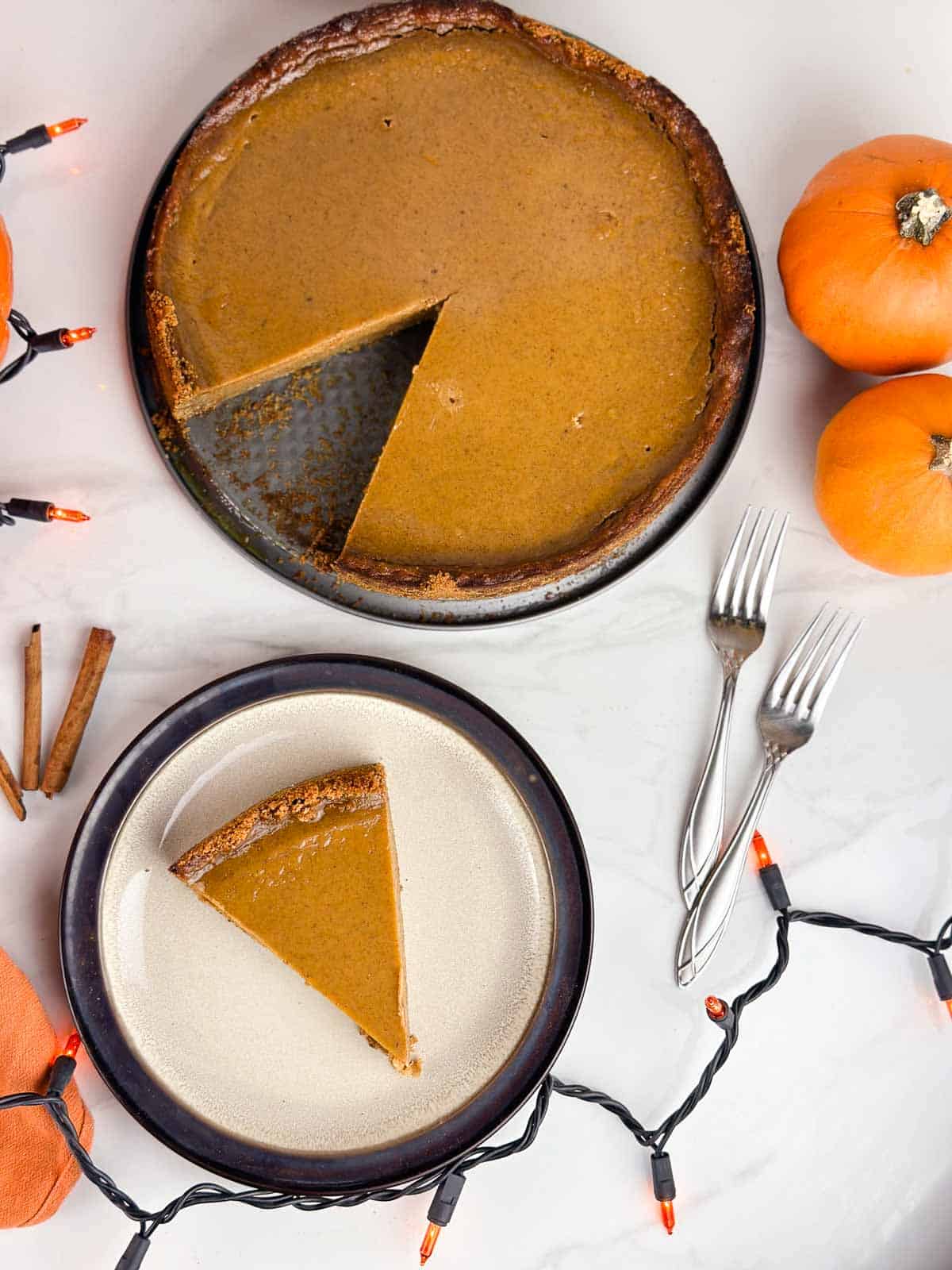 Pumpkin pie with graham cracker crust is a lovely holiday dessert with creamy pumpkin custard on top of crunchy graham crust.