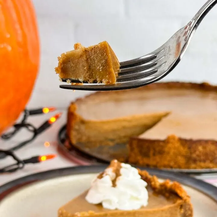 Pumpkin pie with graham cracker crust is a lovely holiday dessert with creamy pumpkin custard on top of crunchy graham crust.