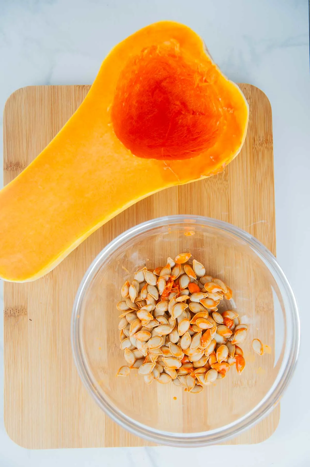 The seeds after you scoop them out of the butternut squash still need to be rinsed.