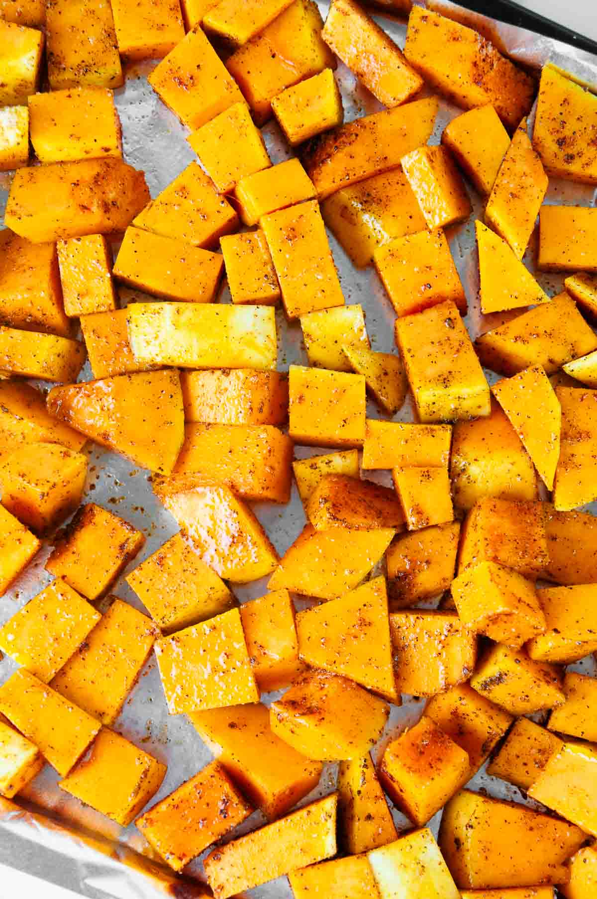 Spiced Butternut Squash on a cookie sheet ready to roast