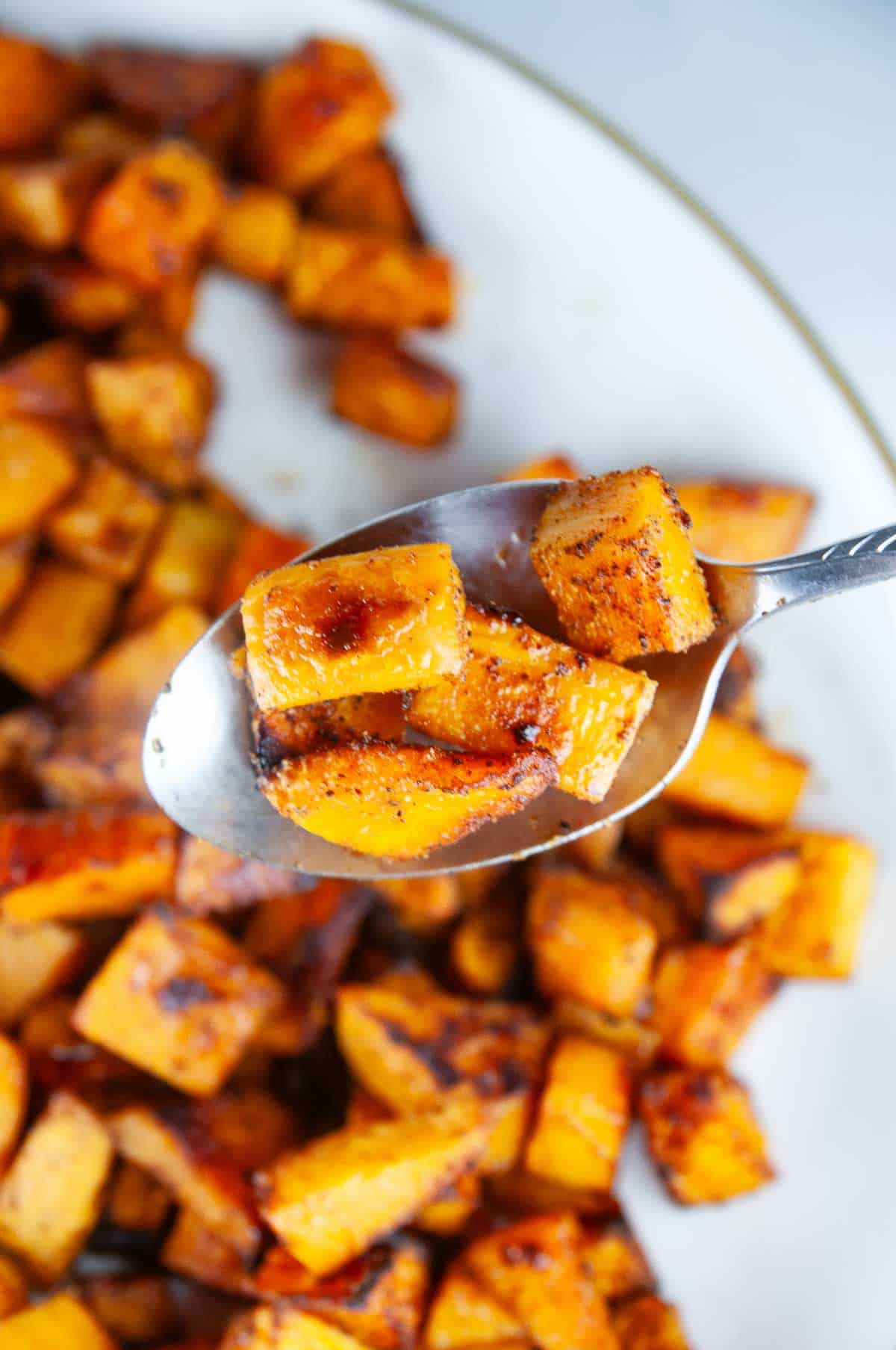 Roasted spice butternut squash is a savory butternut squash recipe with bold flavors like chili powder and garlic. This is a standout variation on traditional sweet roasted squash recipes!