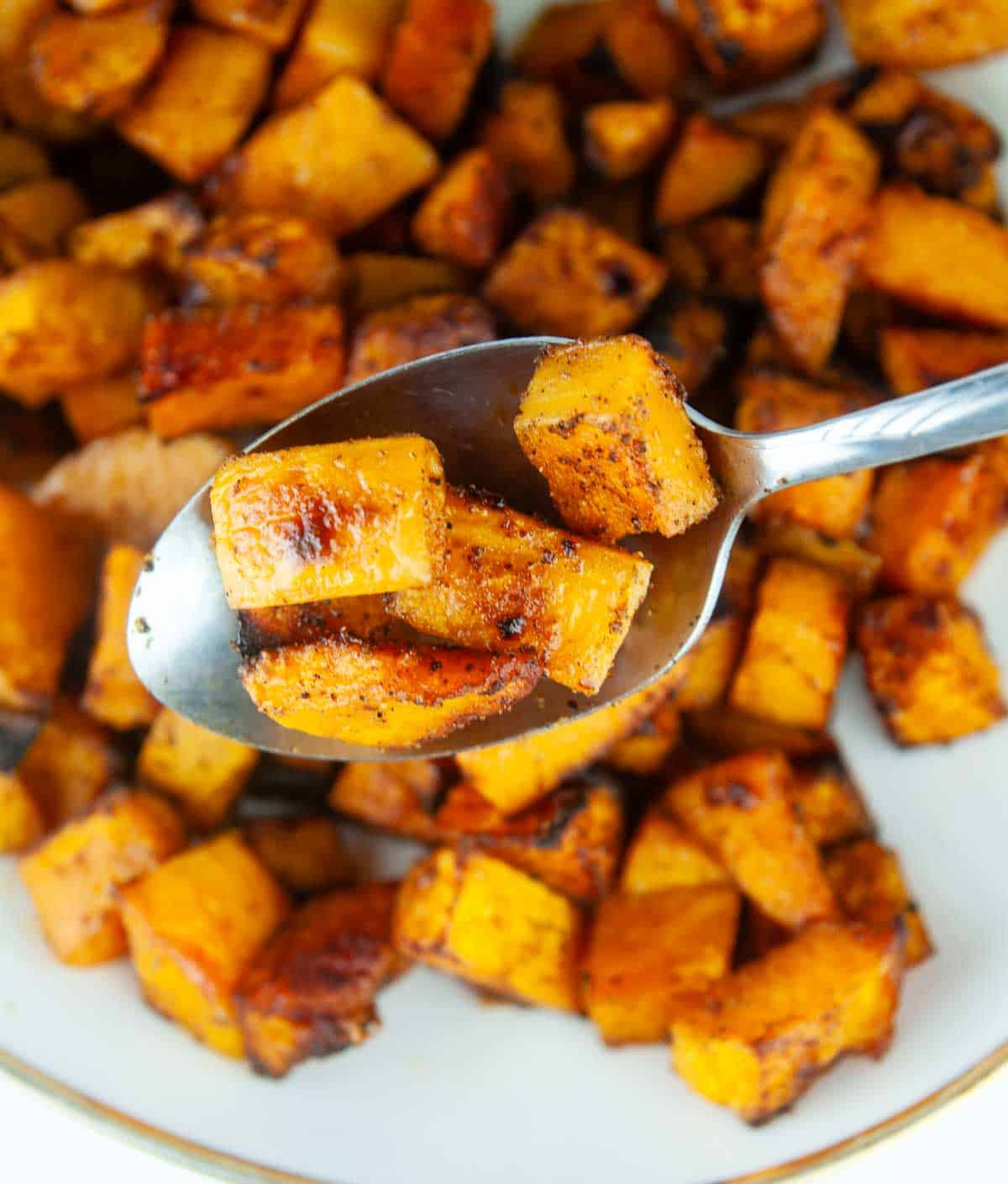 Roasted spice butternut squash is a savory butternut squash recipe with bold flavors like chili powder and garlic. This is a standout variation on traditional sweet roasted squash recipes!