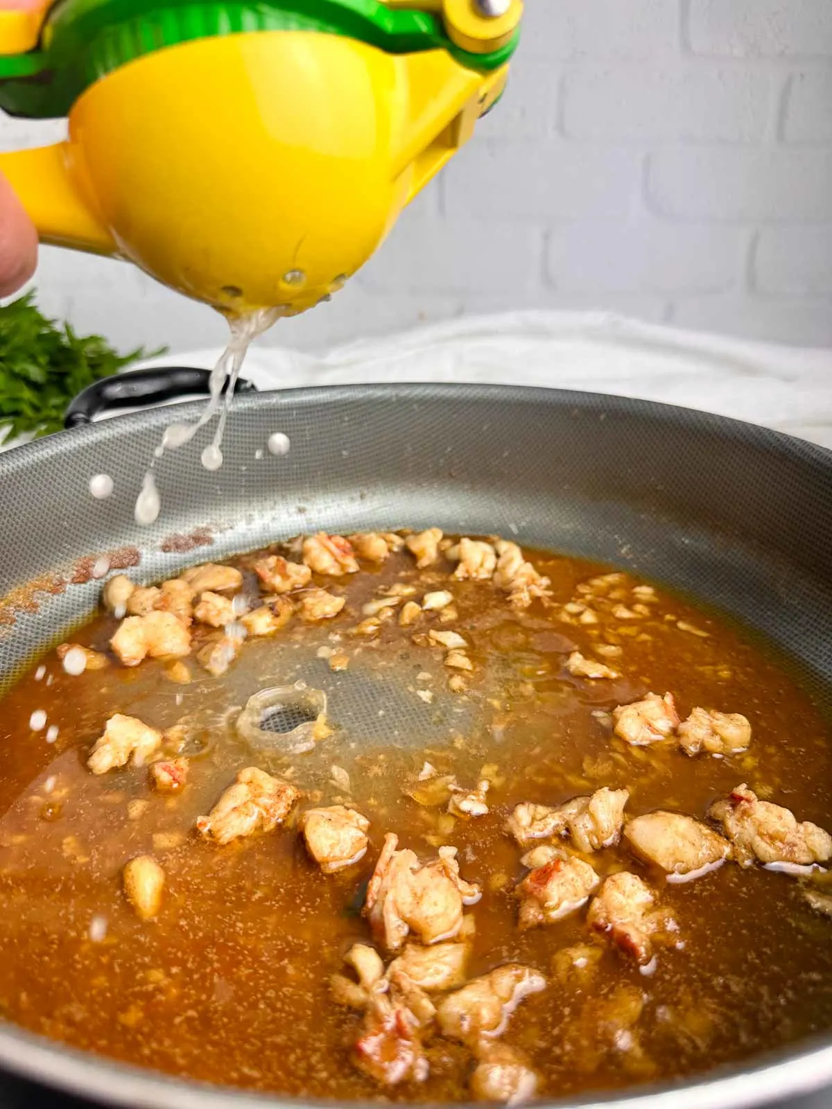 Squeeze lemon juice into the pan with the brown butter and lobster meat.