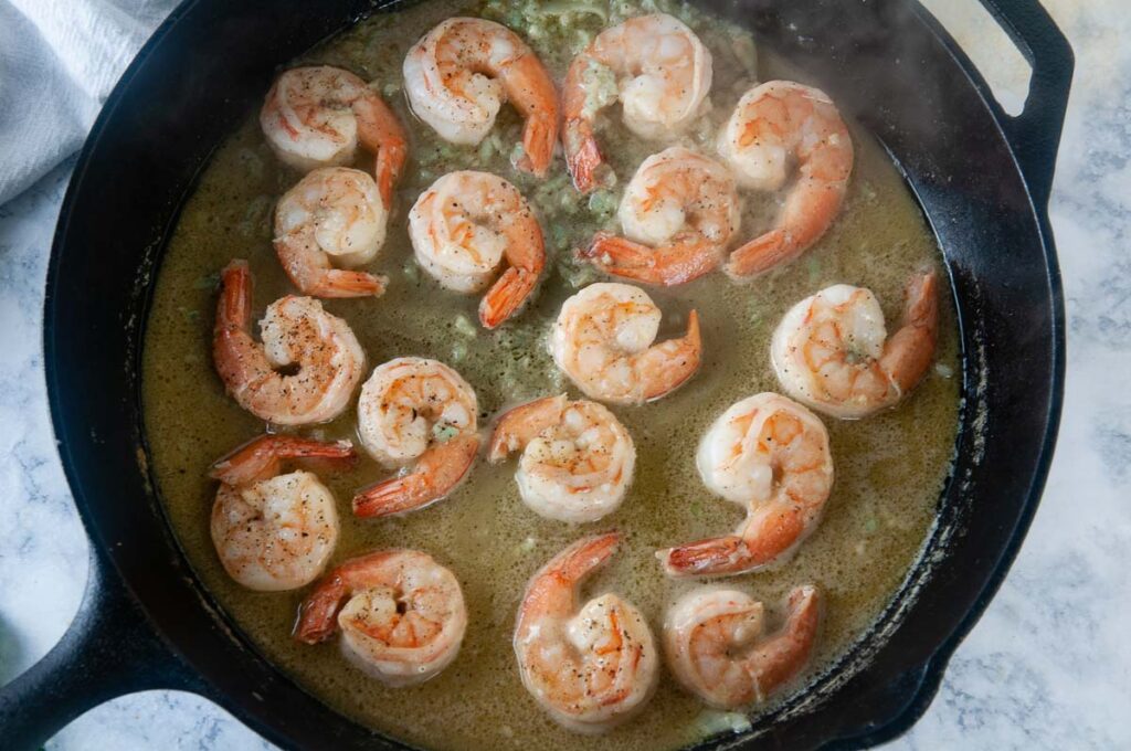 Easy Shrimp Scampi - flip the shrimp and cook on both sides