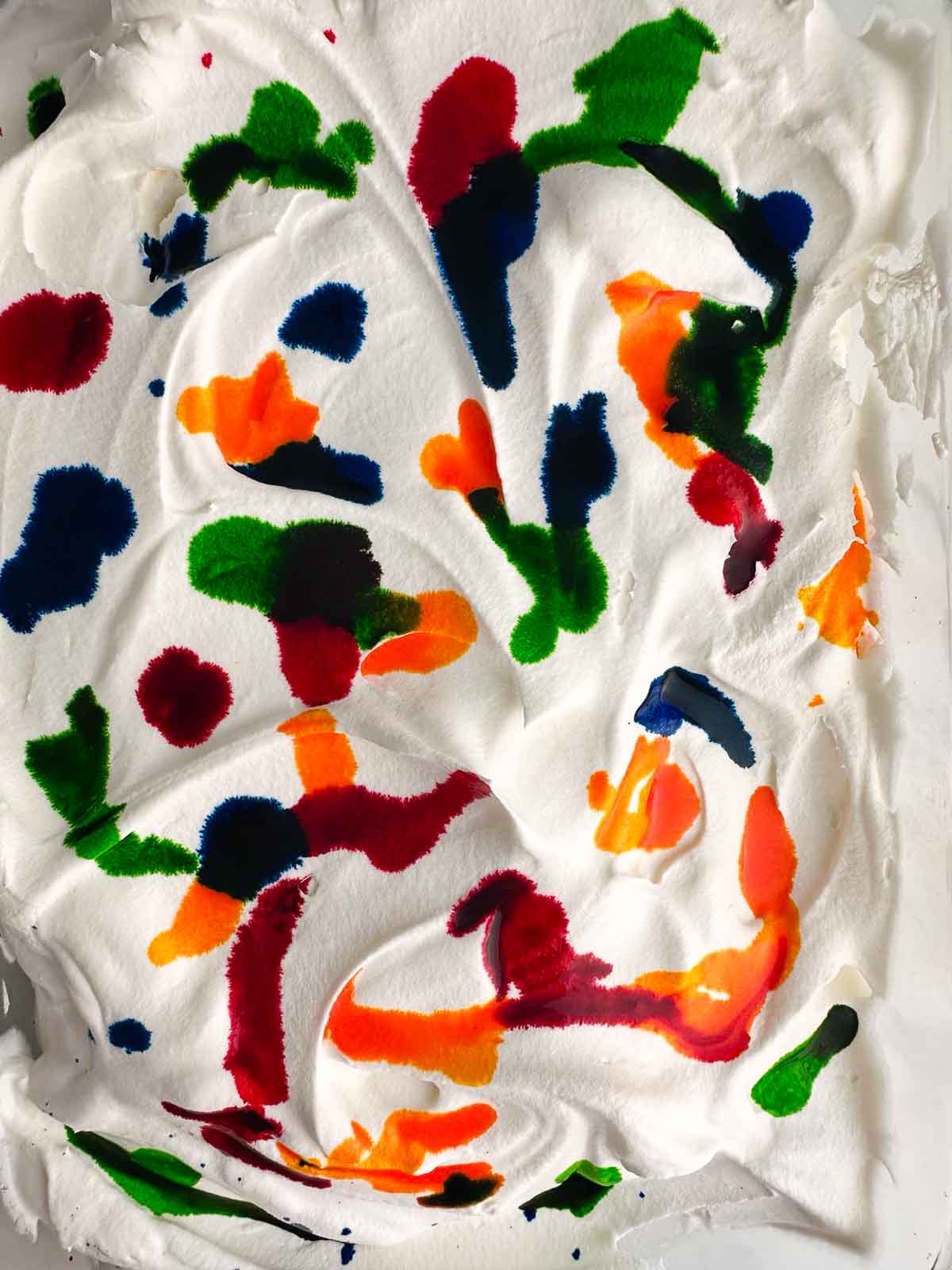 Dot the Cool Whip with food coloring.