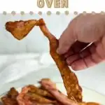 A photo of a hand picking up a piece of bacon off a plate of bacon in a text box with the words "How to Make Bacon in the Convection Oven"