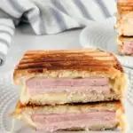 A photo of ham and cheese paninis set into a text box reading ham and cheese paninis
