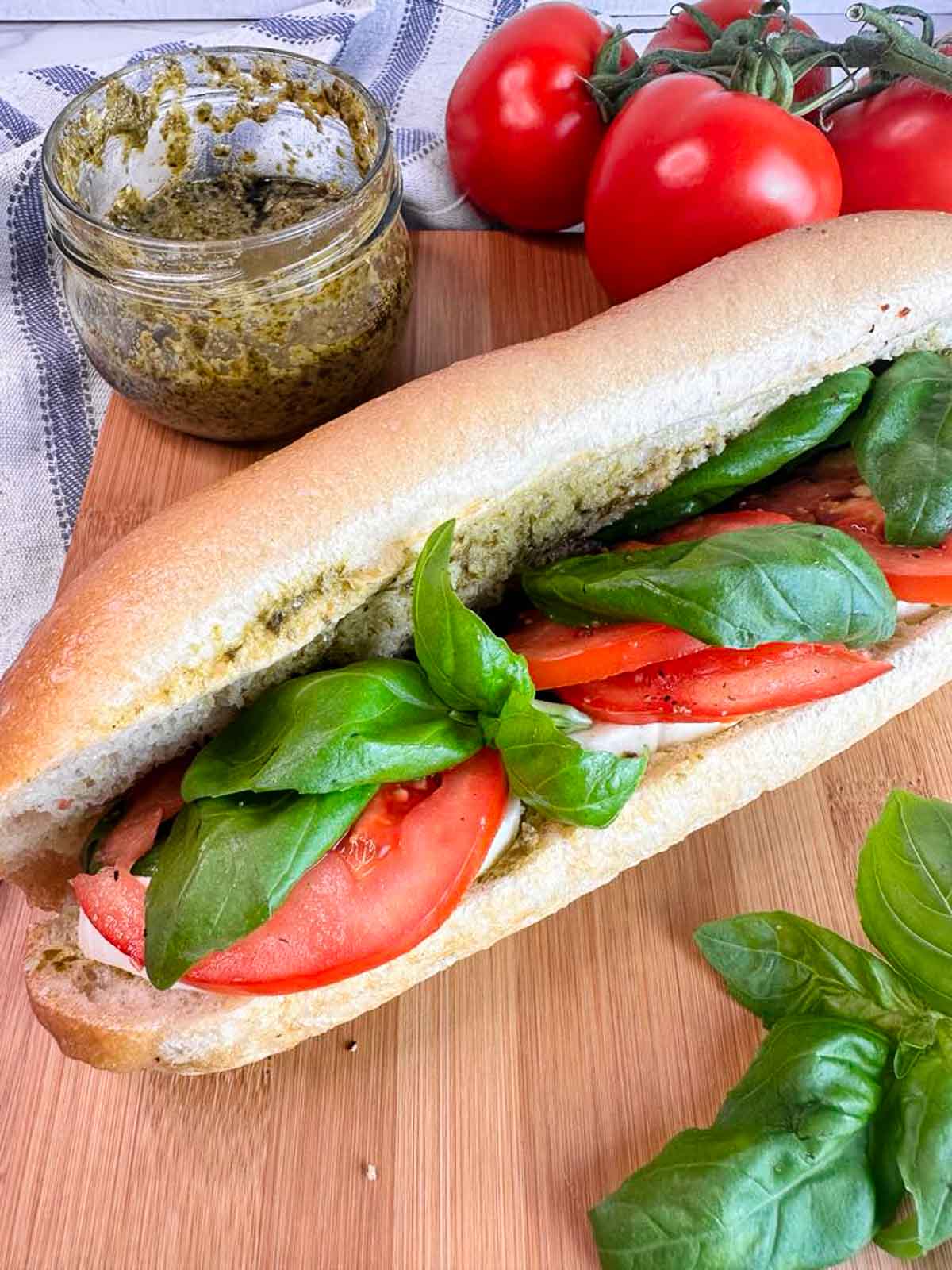 A baguette caprese sandwich with pesto is a delicious and easy lunch or dinner