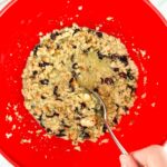 Stir the stuffing mix together with the butter, milk, and dried cranberries.